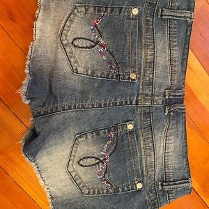 Jean shorts with rhinestones on the back pockets